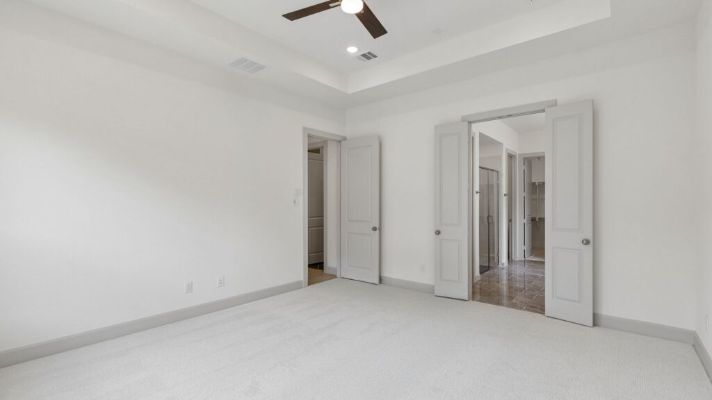 Owner's suite in 15734 Split Bark Lane at Hazelwood 55' Series in Frisco, TX.